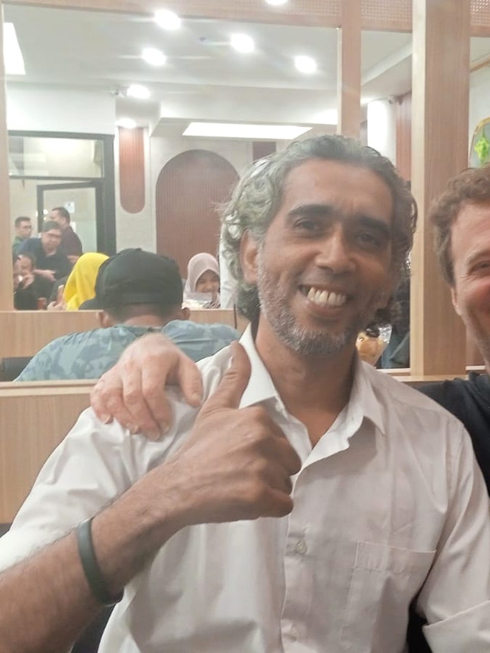 Ahmad Salim Saleh with a BROS Wisata guest